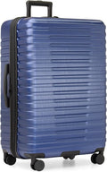 Expandable, durable hardshell suitcase with 8 spinner wheels; Navy Blue, large checked size (30-inch)